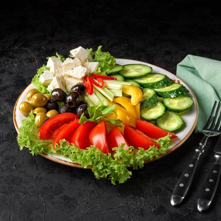 assorted-fresh-vegetables-plate-black-surface_116118-1162 Making the Case for a Vegetarian Lifestyle: A Healthier You, A Better World